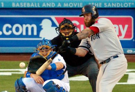 everyone in this picture has the same job, to be locked in and see the baseball