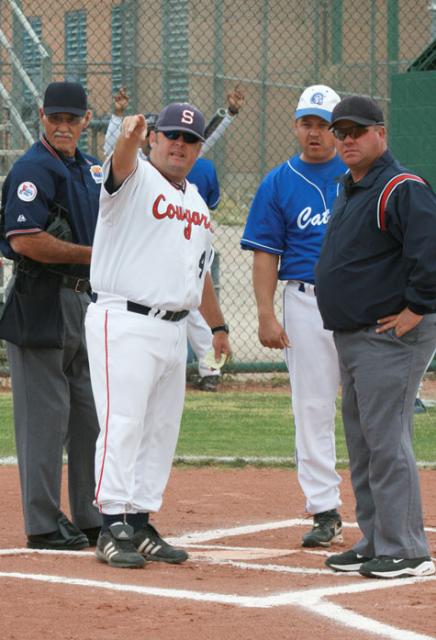 While coaches and umpires talk at home plate, players can use that time to focus in on the game