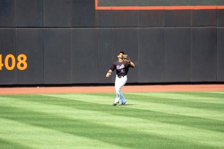 outfielder setting up on fly ball