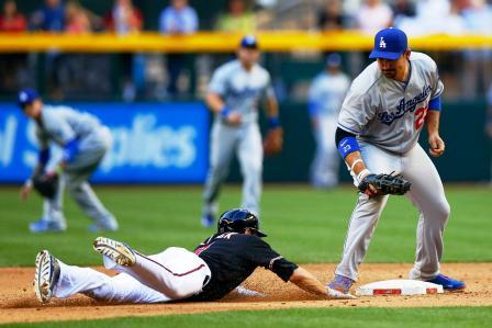 First base trail, back pick at 2B