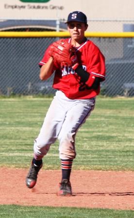 infielder setting feet and gaining ground, in preparation to throw