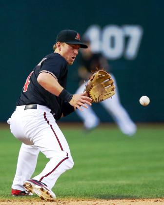 Cliff Pennington making the adjustment to catch and throw