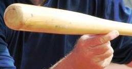 Grip Bat between your thumb and index finger