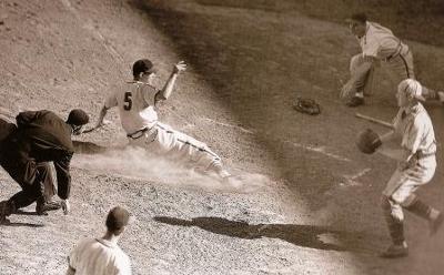 Everyone in on the action at home plate